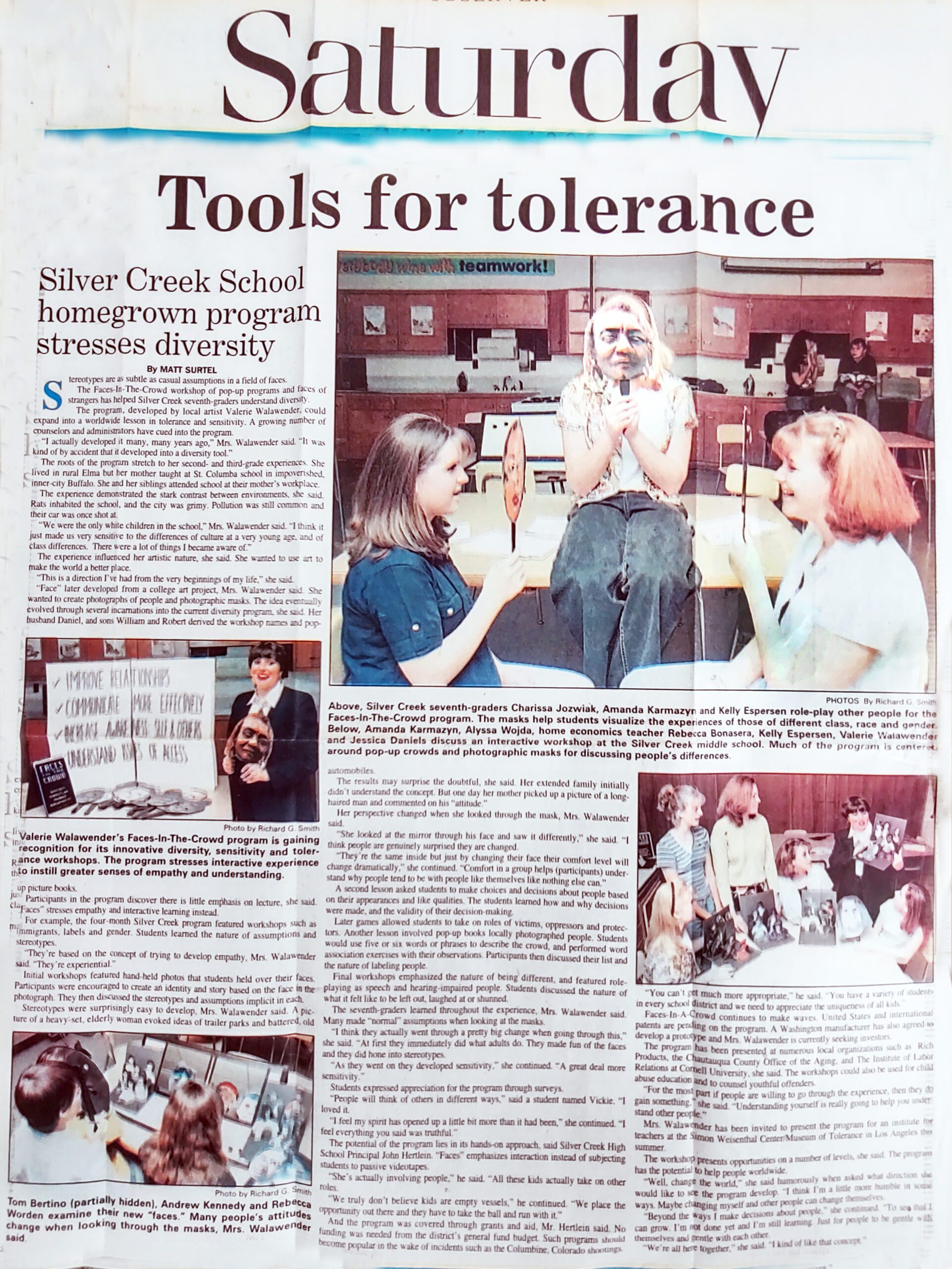 A Newspaper With a Picture of a Person and a Child 2